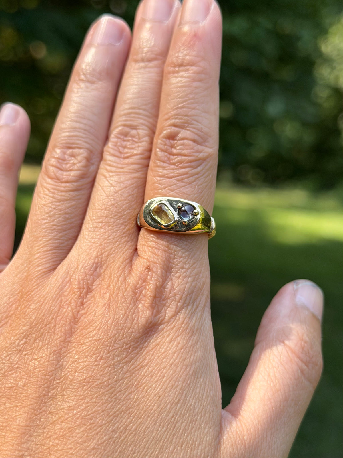 14k Dinner ring with yellow and blue-violet sapphires.