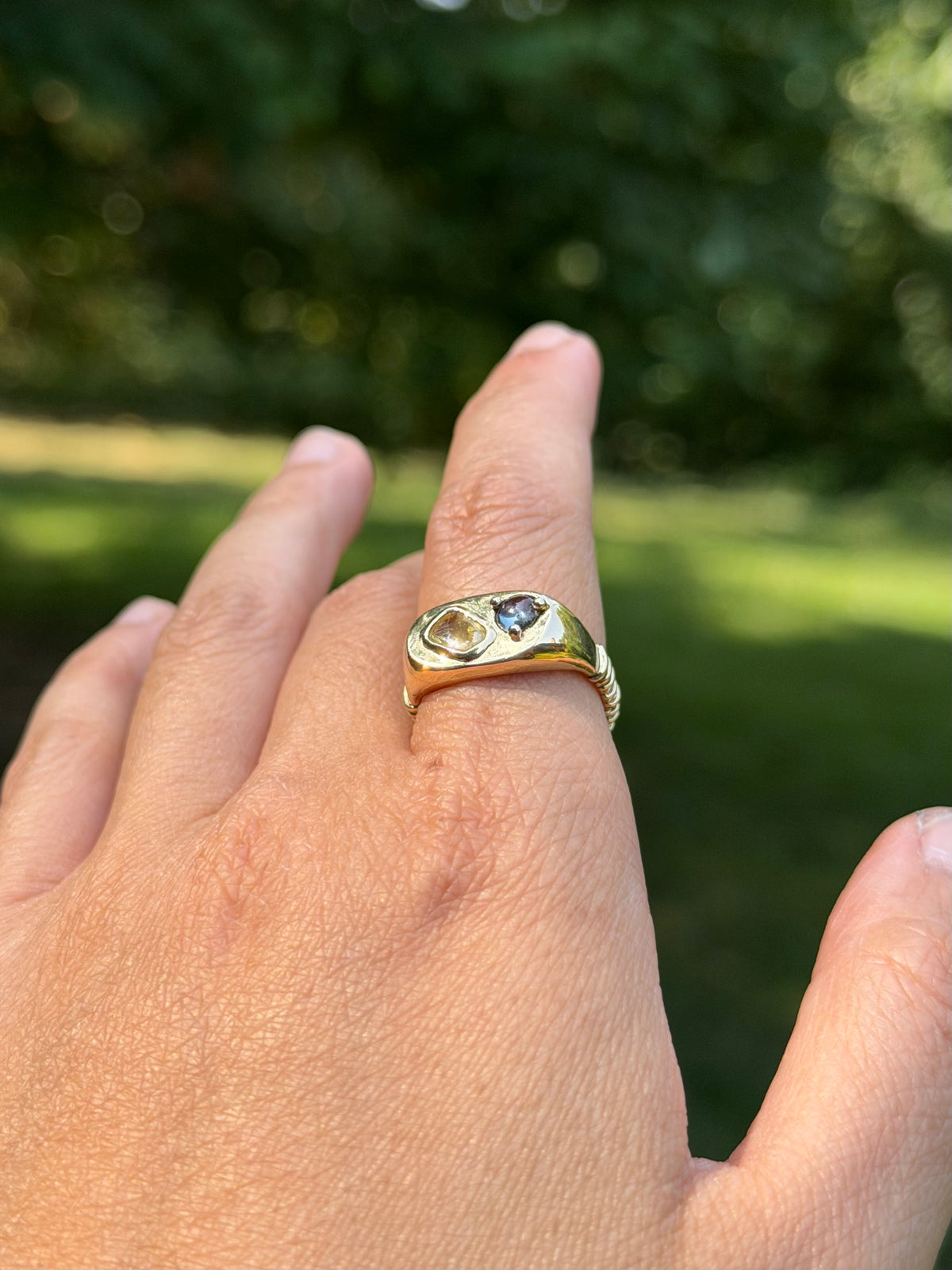 14k Dinner ring with yellow and blue-violet sapphires.