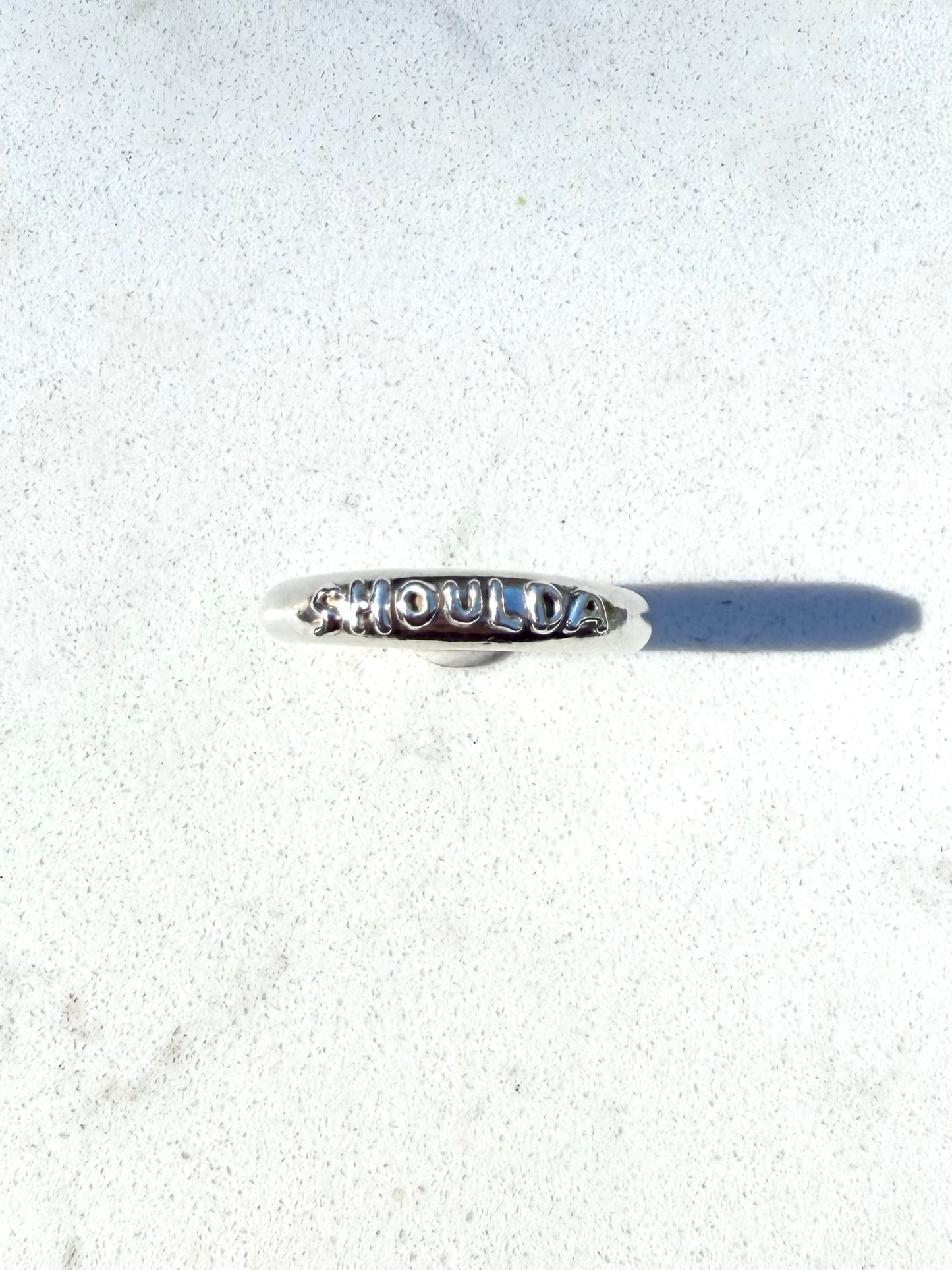 Shoulda ring